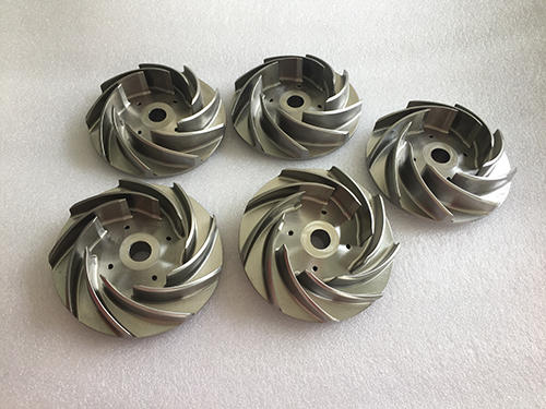 How are the processes of CNC processing divided?